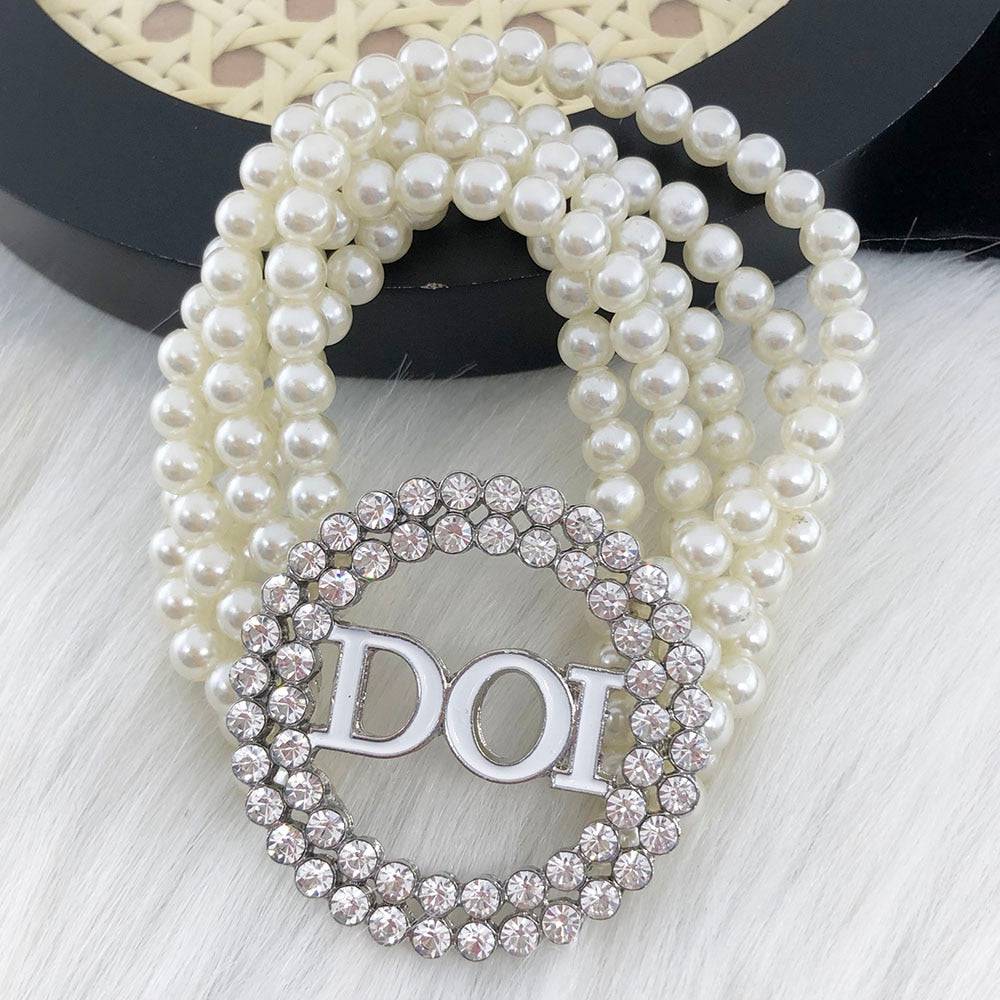 PHA DOI Bracelet - White Pearls & Charm